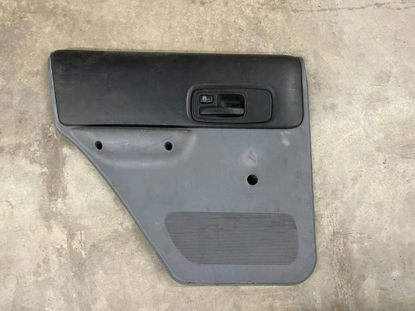 Cherokee XJ (97-01) Driver Rear Door Panel - Black and Grey